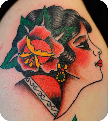 the Virgrn de Guadeloupe done in a traditional American tattoo style:
