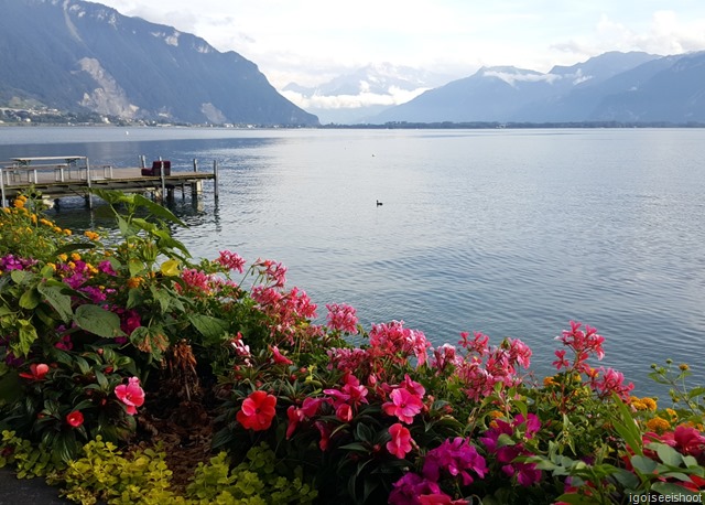 Montreux’s Lakeside Promenade Fleuri with views of Lake Geneva and distant mountains.