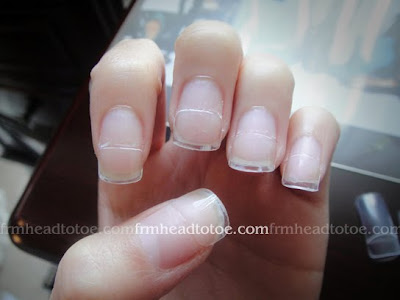 the glued edge of the tips so it lays smoother with your natural nail