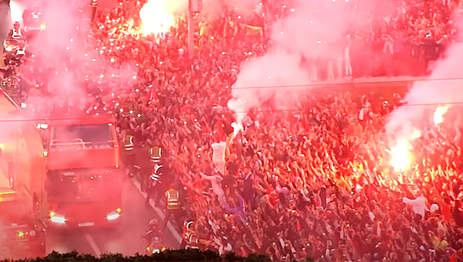 celebrations made by fans with flares while morroco's national team players arrives from FIFA world cup in qatar