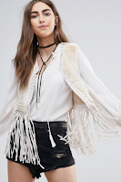 http://www.asos.com/raga/raga-the-nomad-faux-fur-fringed-waistcoat/prd/7484057?iid=7484057&clr=Eggshell&SearchQuery=waistcoat&pgesize=9&pge=0&totalstyles=9&gridsize=3&gridrow=2&gridcolumn=3