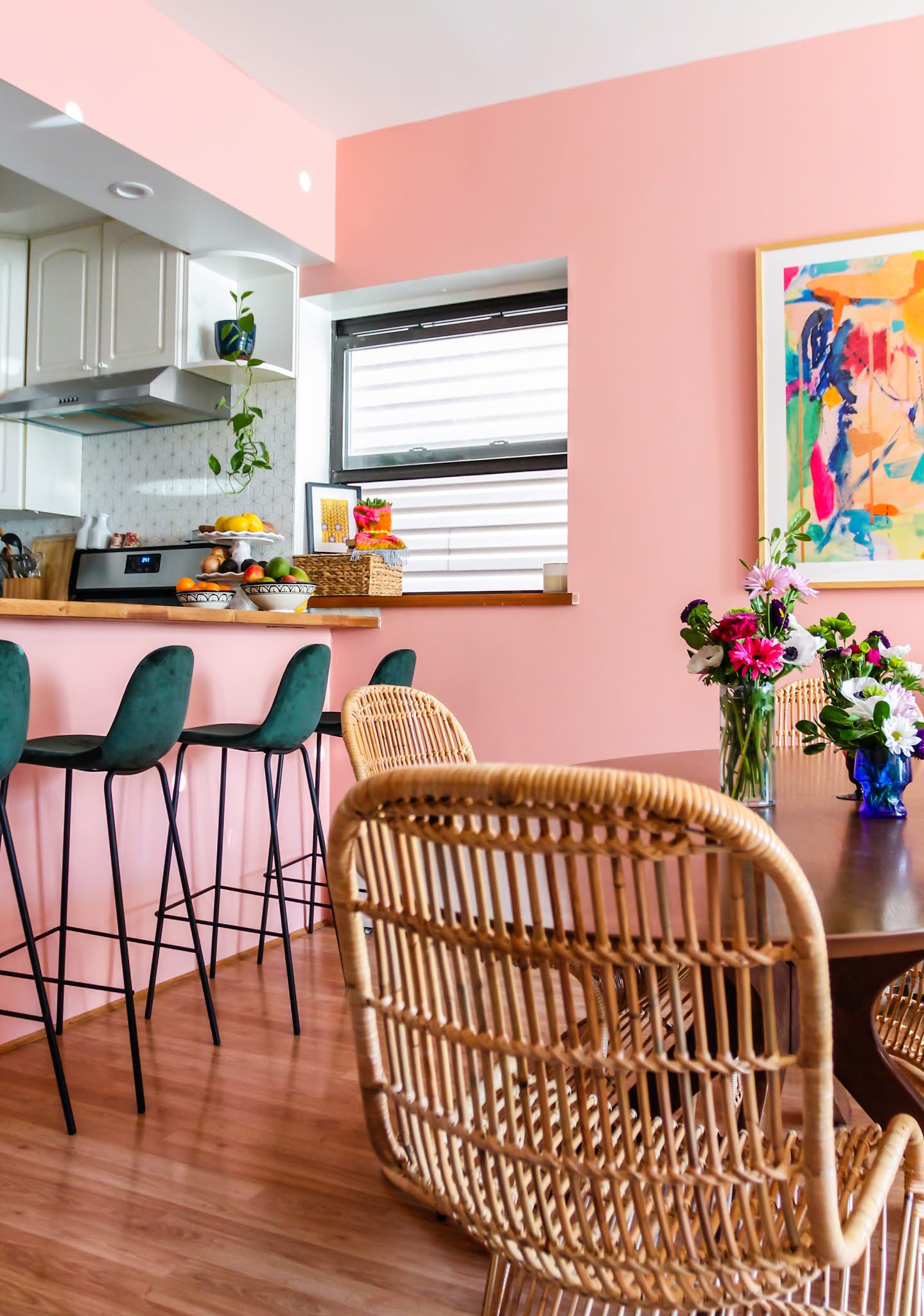 pink and green decor // green barstools // pink kitchen // diy wallpaper fridge // pink and green kitchen // colorful homes // Megan Zietz  Apartment // TfDiaries // pink and green room // pink and green Inspo // barstool inspo // velvet barstools // in mod Sigfred barstool // Green Velvet Mid Century Barstools // colorful bohemian homes // butcher block counter //