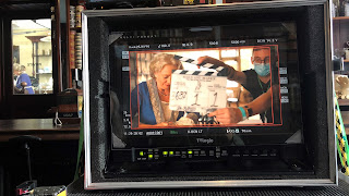 View through a TV film camera at a behind the scenes shot