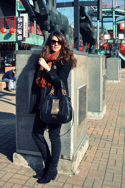 black outfit, guess studded bag, red scarf