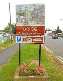 The welcome to Brigg sign alongside the A18 on Bridge Street, including the boating emblem - picture on Nigel Fisher's Brigg Blog