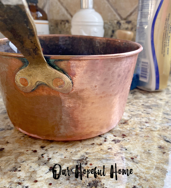 copper pot with brass handle