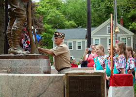 placing the wreath at the World War I memorial