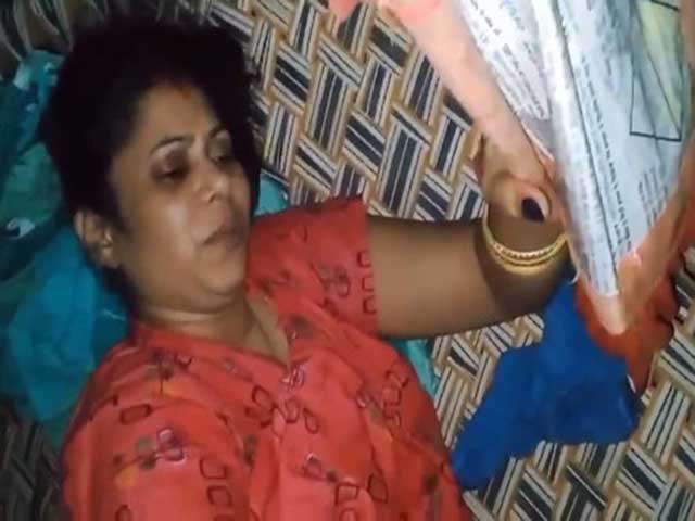 Desi Housewife Giving Handjob Lying On photo
