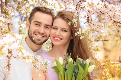 Tulips-flowers-in-background-Brown-haired-beautiful-couple