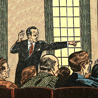 Line art comic book panel. A man with dark hair and mustache in a black suit with red tie points to the left of the panel, directing the attention of an audience sitting in front of him.