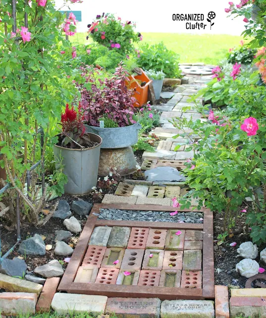 A Whimsical Junk Garden Pathway organizedclutter.net