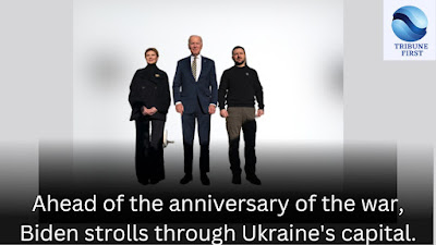 Ahead of the anniversary of the war, Biden strolls through Ukraine's capital.