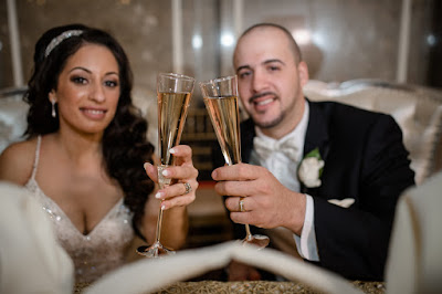 Couple Sharing Toast With The Guests.