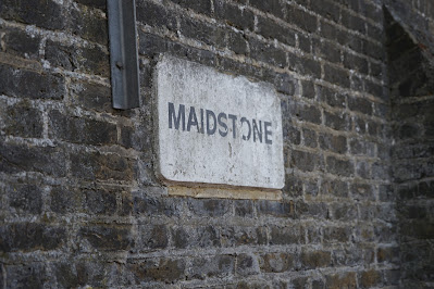 A similar sign saying 'MAIDSTONE'