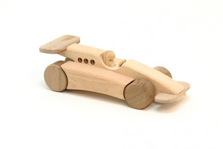 http://www.toyday.co.uk/shop/wooden-toys/wooden-formula-one-racing-car/prod_5467.html