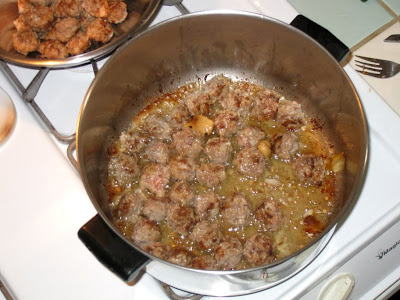 Brown meatballs in peanut oil