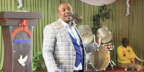 comedian 'Omosh,' real name Joseph Kinuthia, undergoing an exorcism at Pastor Kanyari church photo.
