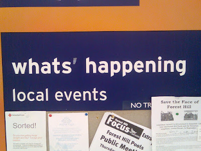 A supermarket noticeboard reading Whats apostrophe happening