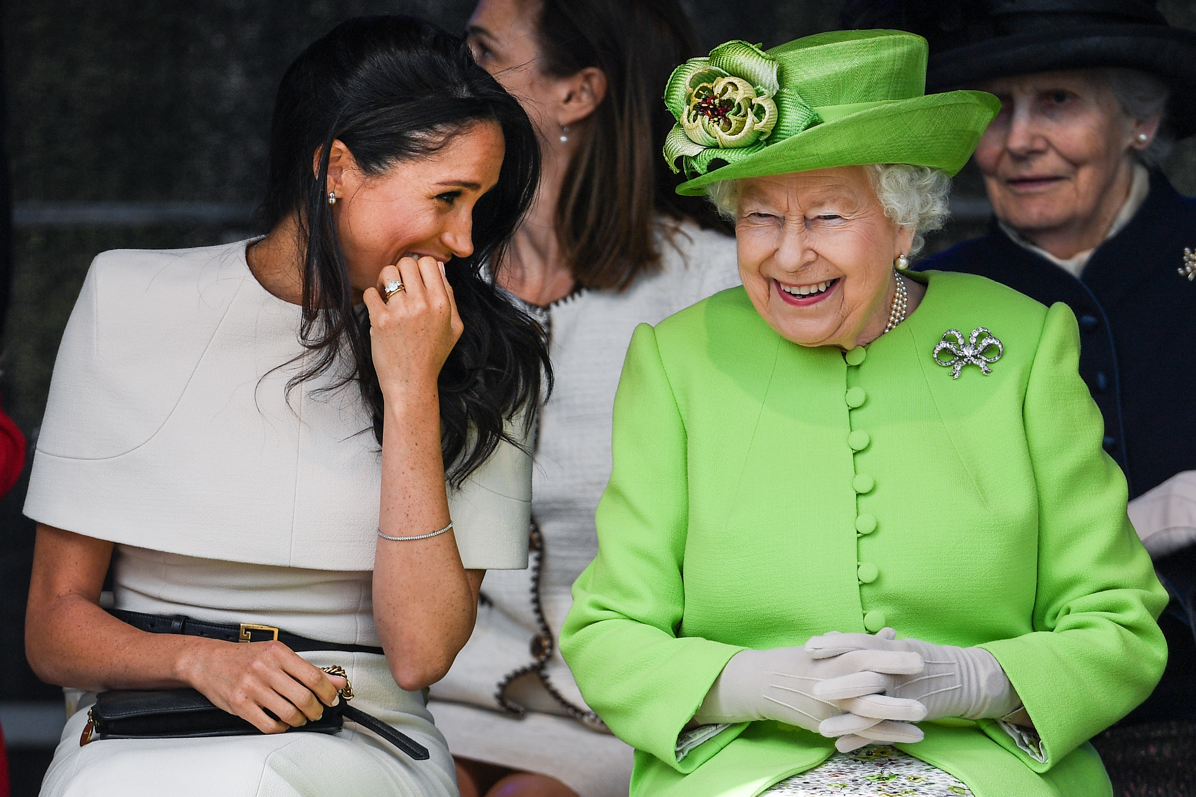 Queen Elizabeth II shares a joke with Meghan Markle