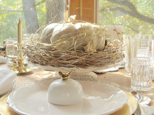 Thanksgiving gold and white table setting is a reminder of the abundance in our lives