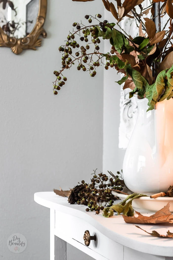 dried berries in vintage ironstone pitcher