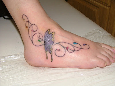 butterfly tattoos for foot. utterfly tattoos on feet.