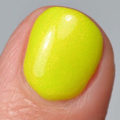 neon yellow nail polish with shimmer swatch