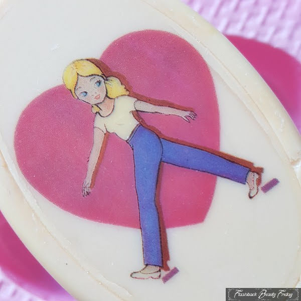 close up of image on soap bar with pink heart and Sindy doll in centre