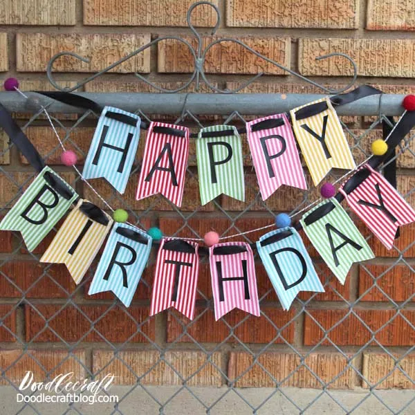 Cricut Maker Rotary Blade Happy Birthday Fabric Bunting DIY! Make the perfect fabric bunting for all the birthday's on your list!  This banner is easy to make using the Cricut Maker with the Rotary Blade and iron-on vinyl with the EasyPress 2.     It's perfect to hang on the mantle or wall for every birthday you are celebrating! Makes a great backdrop for a party or can be customized to say anything you want for any/every holiday!