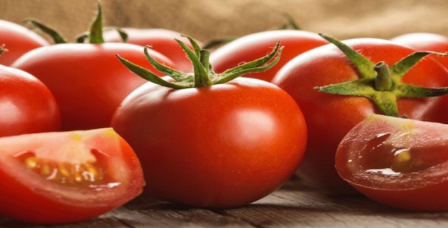 Tomato although often treated as a vegetable, is actually categorized as a ____.