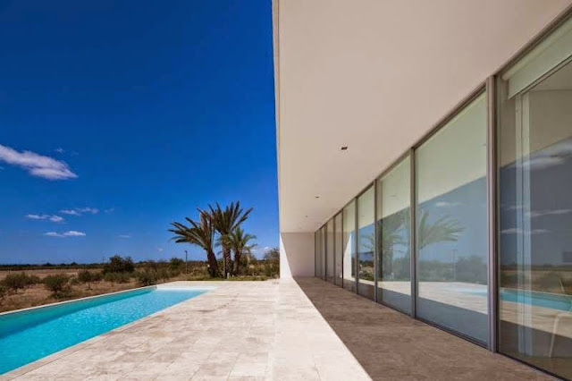 large glass windows Modern House with Pool in Tavira