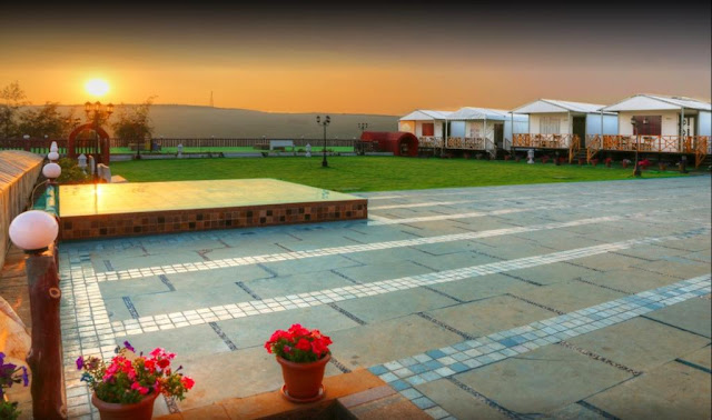 TGL Resort & Spa Mahabaleshwar  Panchgani - Mahabaleshwar Road, At-Post-Met-Gutad, 412806 Mahabaleshwar, India  Contact No. : 9427703236 / 8000999660 E-mail : info@aksharonline.com                                                                                                                                                                                                                     Via Lakhela Resort & Spa, a resort, is a property located in Kumbhalgarh. Each accommodation at the resort has mountain views, and guests can enjoy access to an outdoor swimming pool. The resort boasts a fitness centre and a 24-hour front desk.    At the resort rooms come with a desk, a flat-screen TV and a private bathroom. The rooms are equipped with a kettle, while selected rooms are equipped with a balcony and others also have lake views. All guest rooms include a wardrobe.    Guests at Via Lakhela Resort & Spa can enjoy a Continental breakfast. The in-house vegetarian restaurant, serves Indian and Chinese cuisine.    Guests have access to the on-site business centre where they can make use of the luggage storage service.     Kumbalgarh Fort is 3.4 km from the accommodation. The nearest airport is Maharana Pratap Airport, 63 km from Via Lakhela Resort & Spa. - Kumbhalgarh Resort Booking, Hotels in Kumbhalgarh - akshar infocom, akshar travel services, ghatlodia, ahmeadabad, 9427703236, 8000999660. Resorts in kumbhalgarh hotel booking, kumbhalgarh hotel booking, resort near kumbhalgarh, lake view room hotel, resort kumbhalgarh, www.aksharonline.com, www.aksharonline.in, email : info@aksharonline.com International Air Tickets || Domestic Air Tickets || Cruise Booking || International& Domestic Packages || Hotel Booking World Wide ||  Visa Services || Passport Services || Overseas Travel Insurance || Railway Ticket || Bus Ticket ||  Car Rental || Foreign Exchange || Western Union & Transfast Money Transfer Services & More...  Ground Floor-11, Vishwas Shopping Center Part-1, R.C.Technical Road, Ghatlodia, Ahmedabad - 380061. Contact No.: 8000999660, 9427703236, aksharonline.com, akshar travel services, travel@aksharonline.com