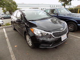 2015 Kia Forte before collision repair at Almost Everything Auto Body.