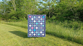 Moonrise quilt by Slice of Pi Quilts using Loved to Pieces fabric by Mathew Boudreax (aka Mister Domestic) for Art Gallery Fabrics