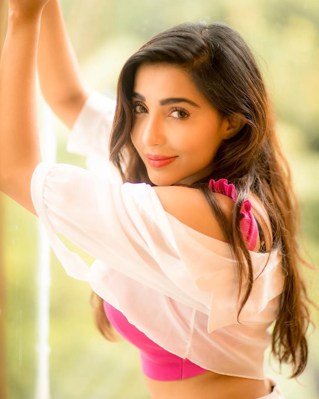 Parvati Nair In Pink Top Photoshoot Pics