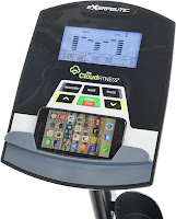 Exerpeutic 5000 Recumbent Bike's console with backlit LCD screen & shelf for mobile phone/tablet, image