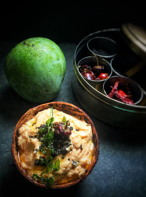 "Delicious and tangy Palakkad Style Raw Mango Pachadi, a nostalgic recipe that brings back cherished memories."