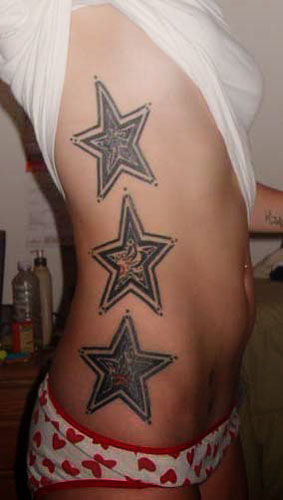 Women Side Body Star Tribal Tattoos