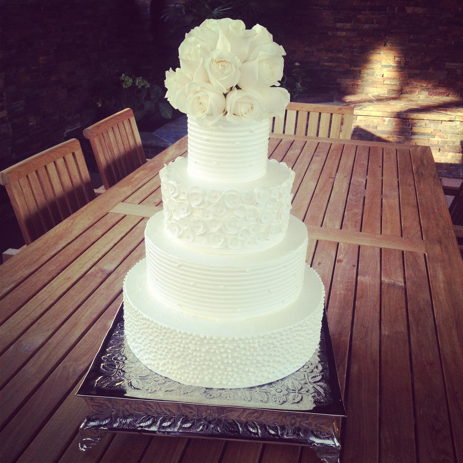 BAKESHOPmarie white  buttercream  wedding  cake  with white  roses