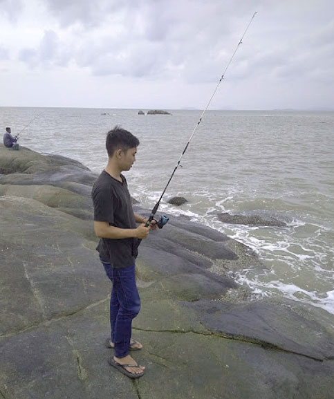 Mancing di Pantai Batu Burung Foto