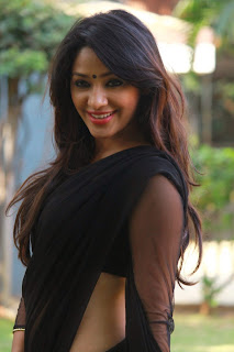 Actress Samruthika  Picture Gallery in Black Saree at Aayirathil Iruvar Movie Press Meet CelebsNext 1.JPG