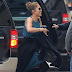 Peek-a-boo! Jennifer Lopez flashes kinky thigh-high boots under maxi dress at the American Idol auditions