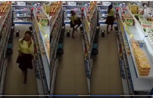 Beautiful Nigeria Lady Caught Stealing From A Supermarket (Video)