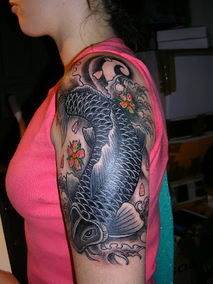 Tattoos Of Koi Fish And Lotus Flowers fighting fish tattoo