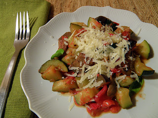 Plate of Ratatouille with grated cheese