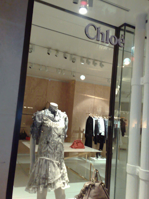 Chloé's shop window ah night.