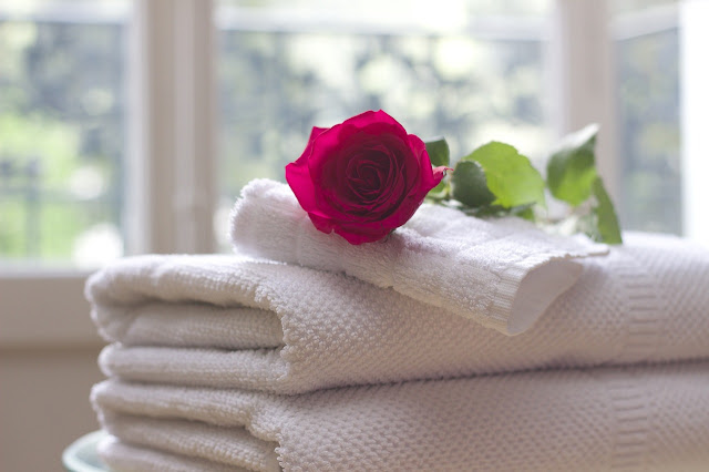 towels and a rose