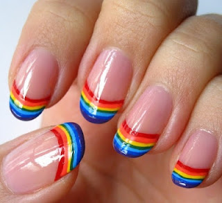 Nails Decorated with Rainbow and Clouds