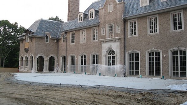 Under construction exterior of French chateau by Enchanted Home
