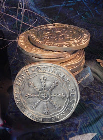 Into the Woods giant gold coin props